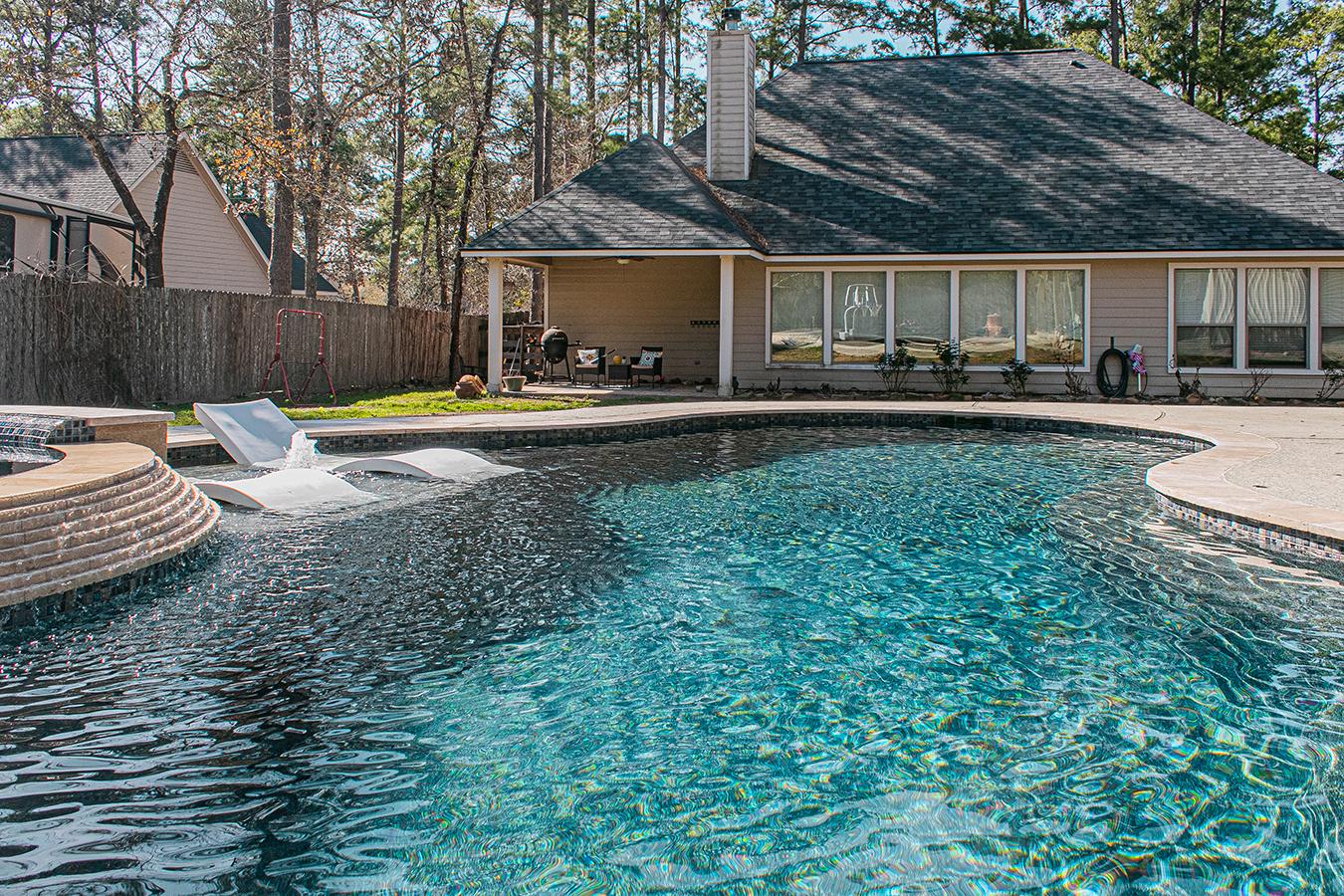 Luxury Pool Renovation with Waterfall Feature